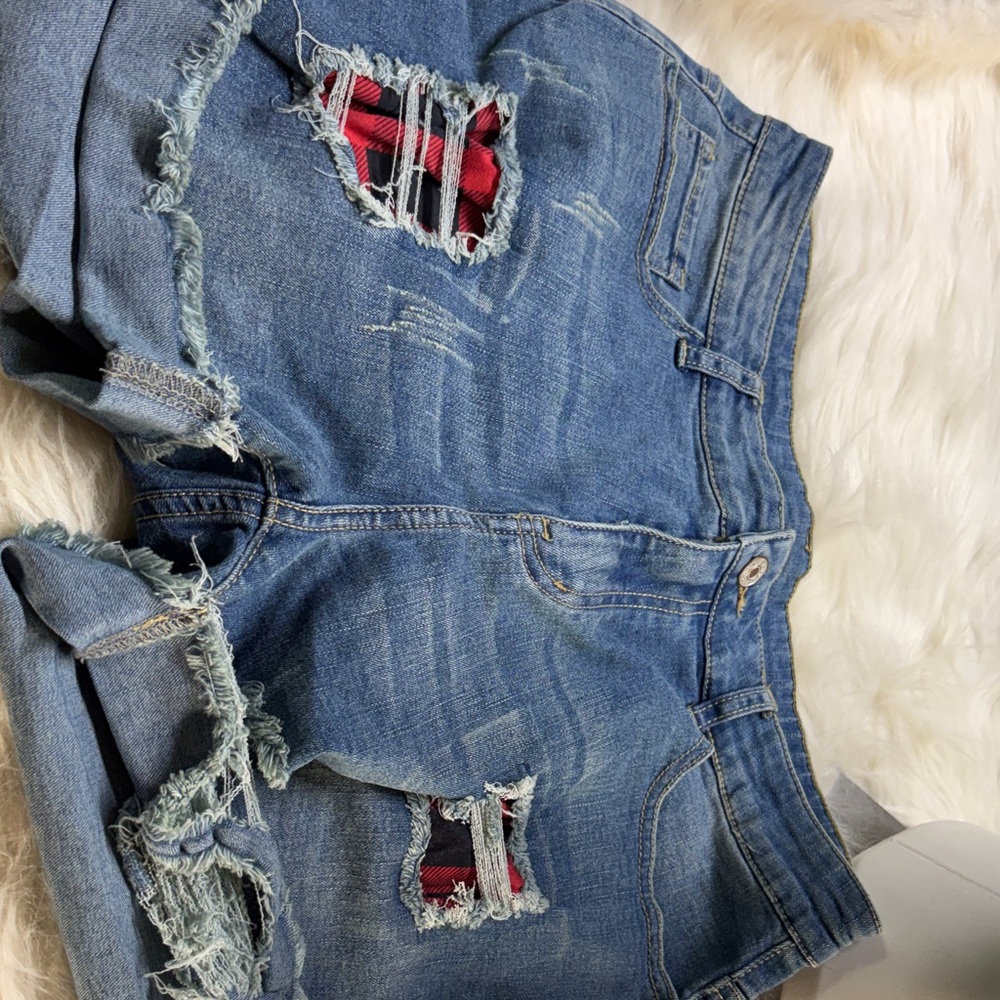 Distressed Denim Shorts with Red Plaid Accents